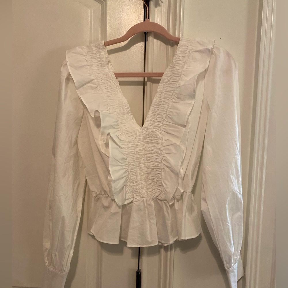 White strut and bolt top